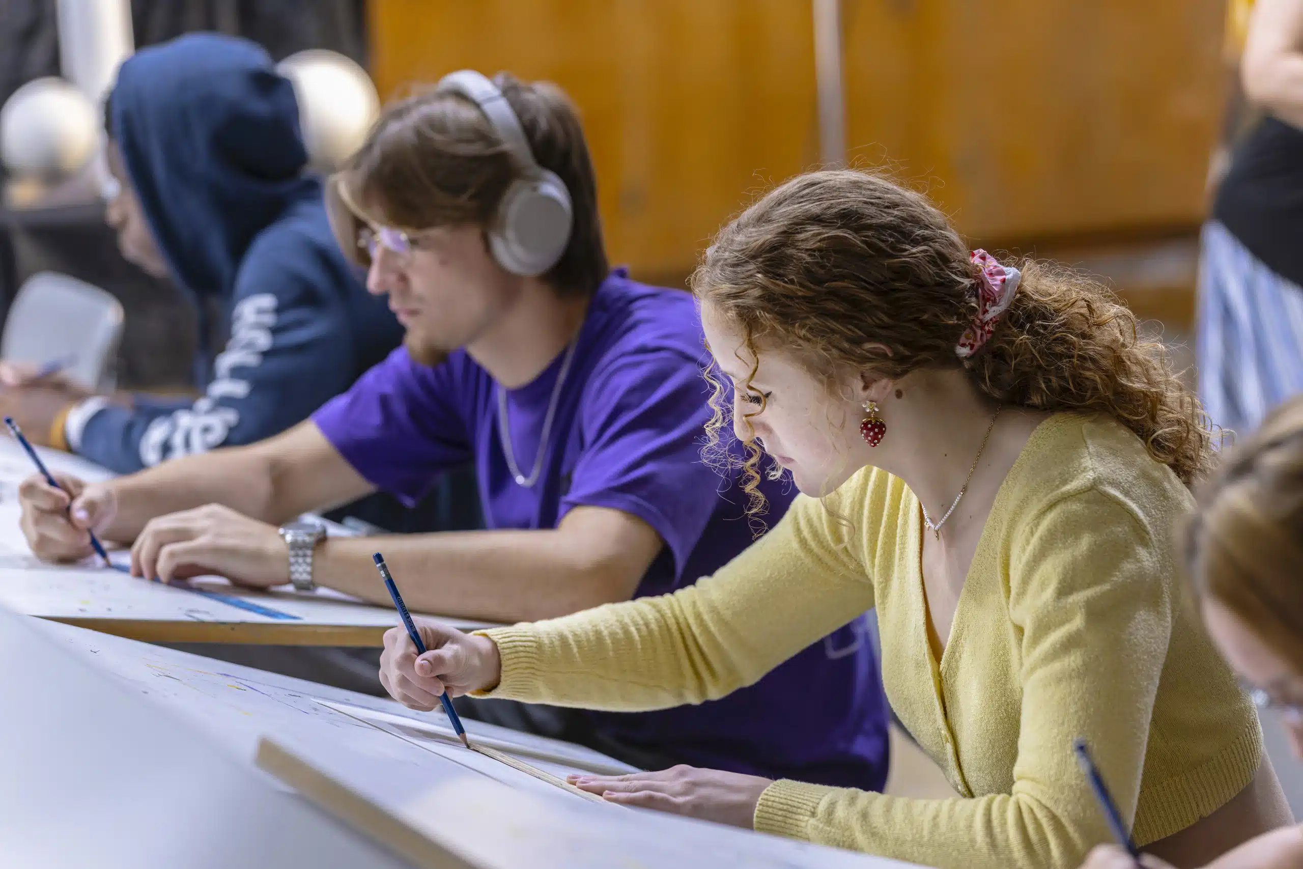 Art students working on their projects inside a KWC art studio