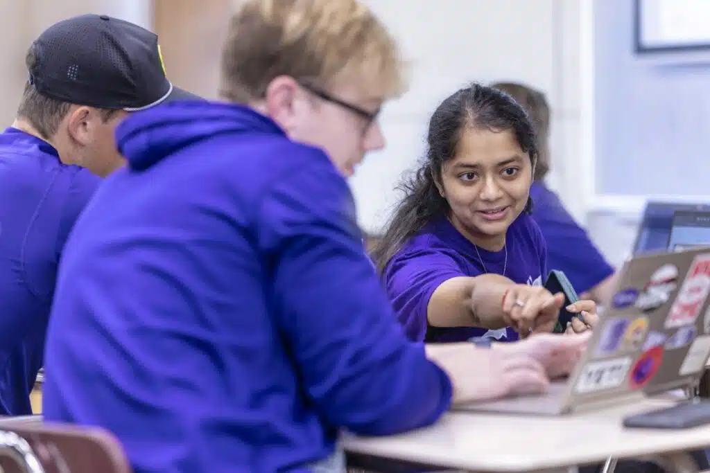 Students working together in a classroom