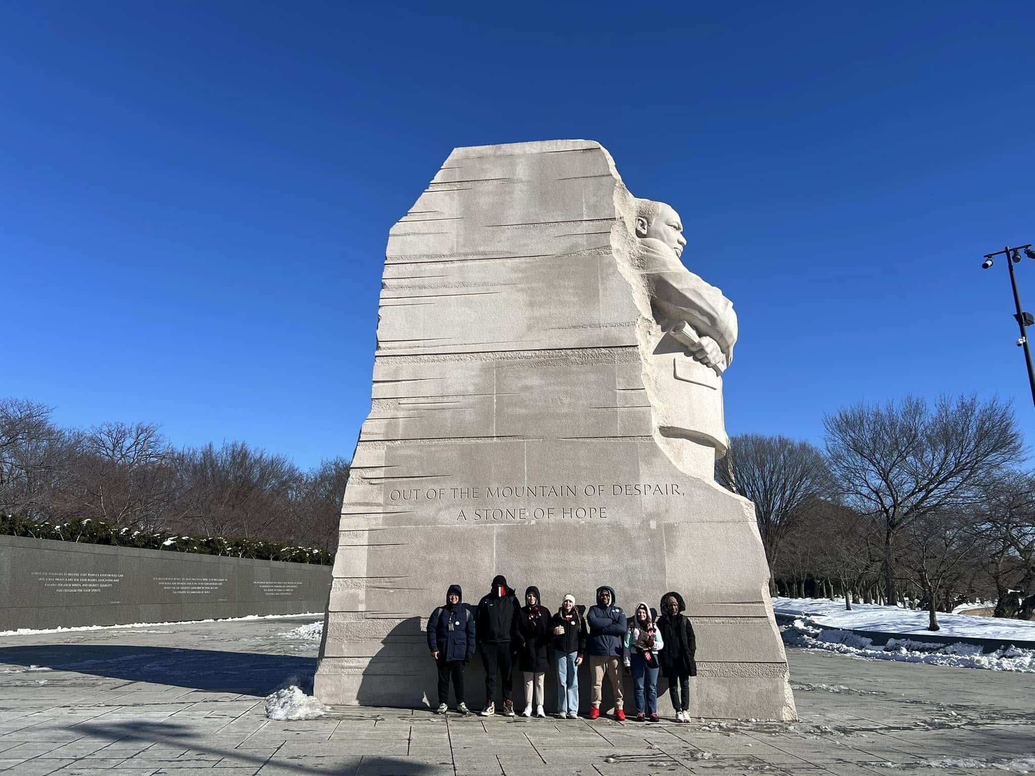 Seven KWC students stand in front of the Martin Luther King Jr. Memorial in Washington, D.C.