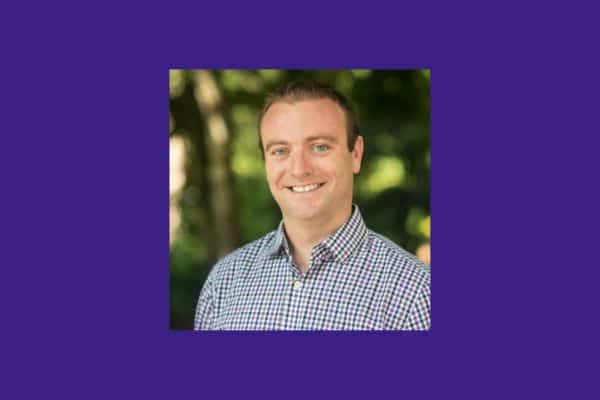 Photo of Hebert on purple background