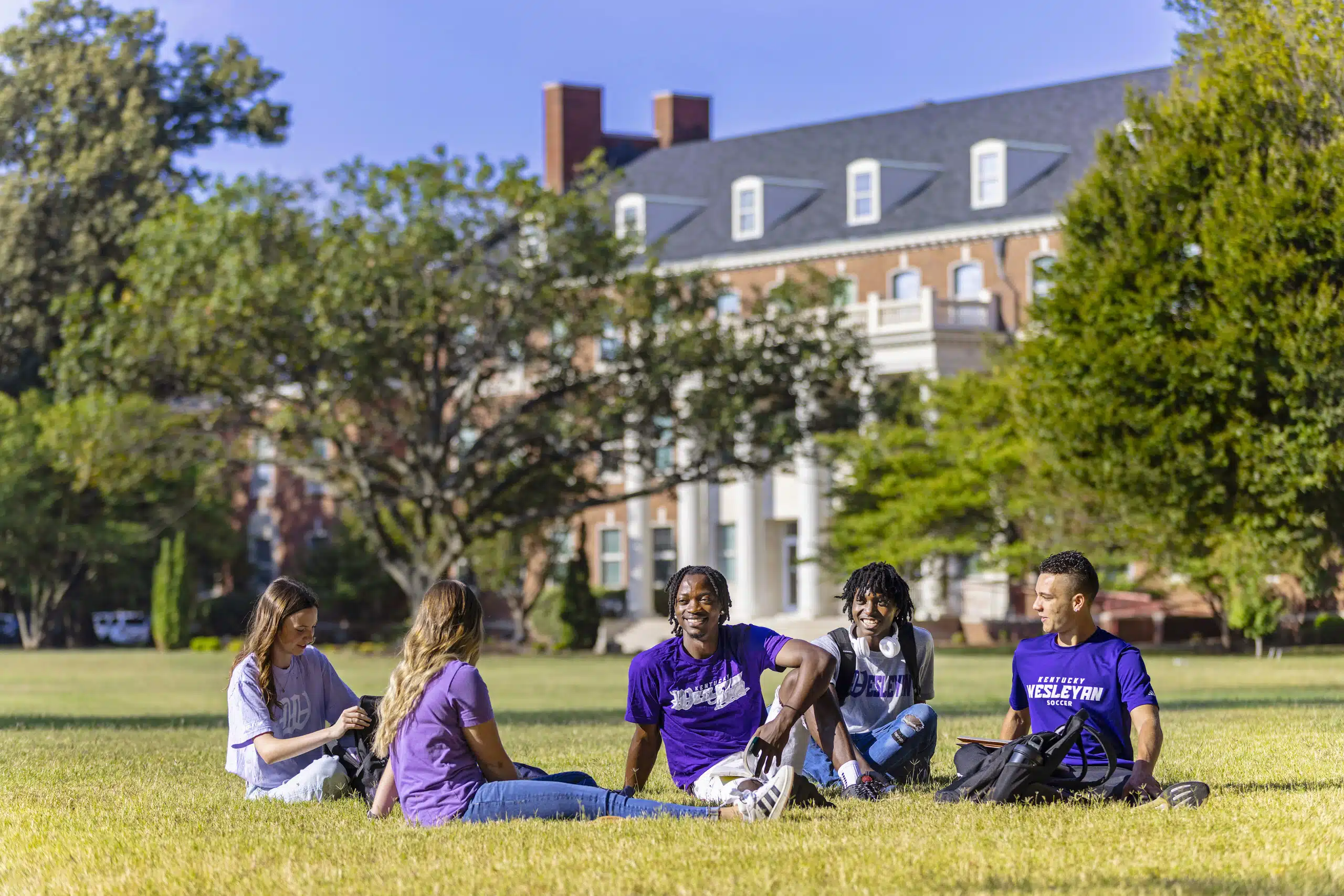 Outdoor Students Front Lawn 3542 Kentucky Wesleyan College Students sitting in the front lawn on campus