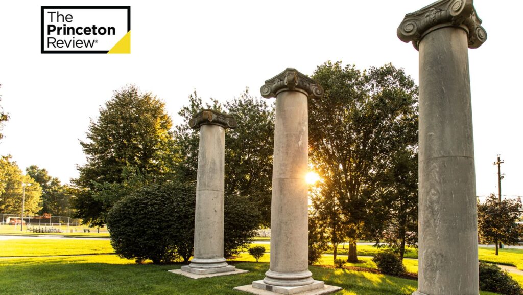 Three pillars on the KWC campus with "The Princeton Review" logo in top left