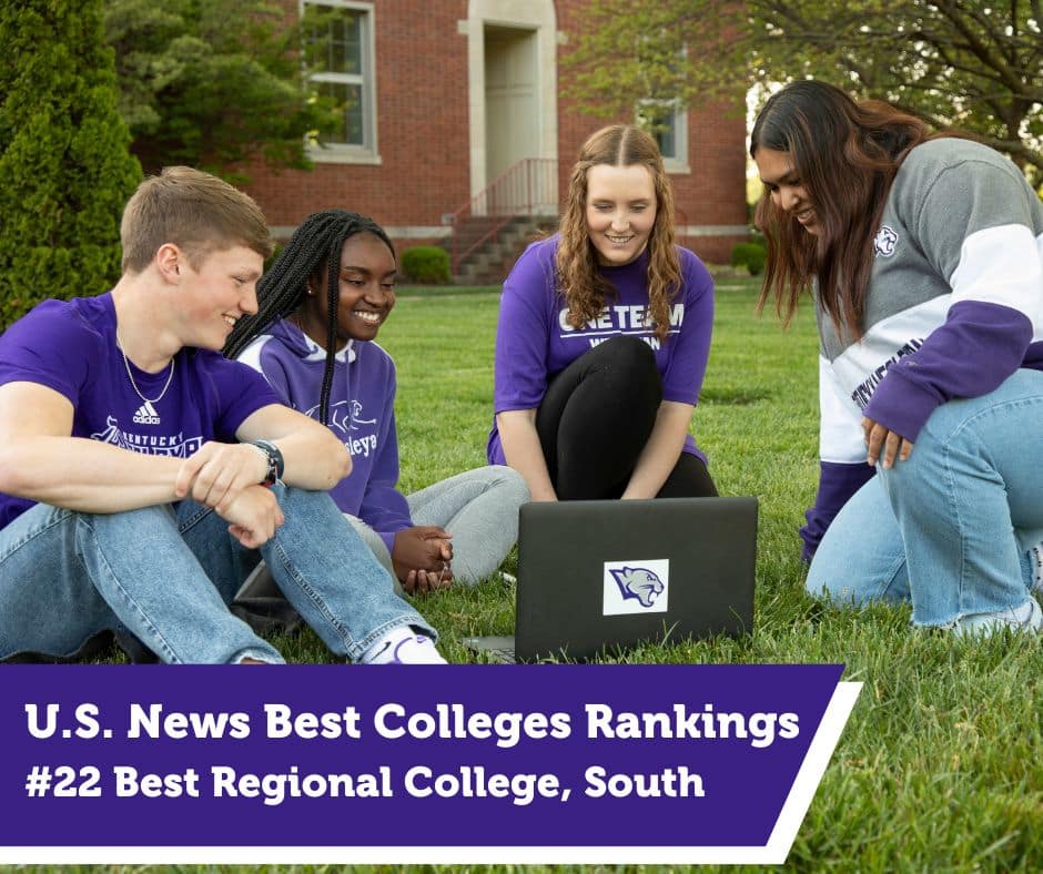 Group of KWC students sitting outside around a laptop, graphic banner at bottom that reads "U.S. News Best Colleges Ranking - #22 Best Regional College, South"